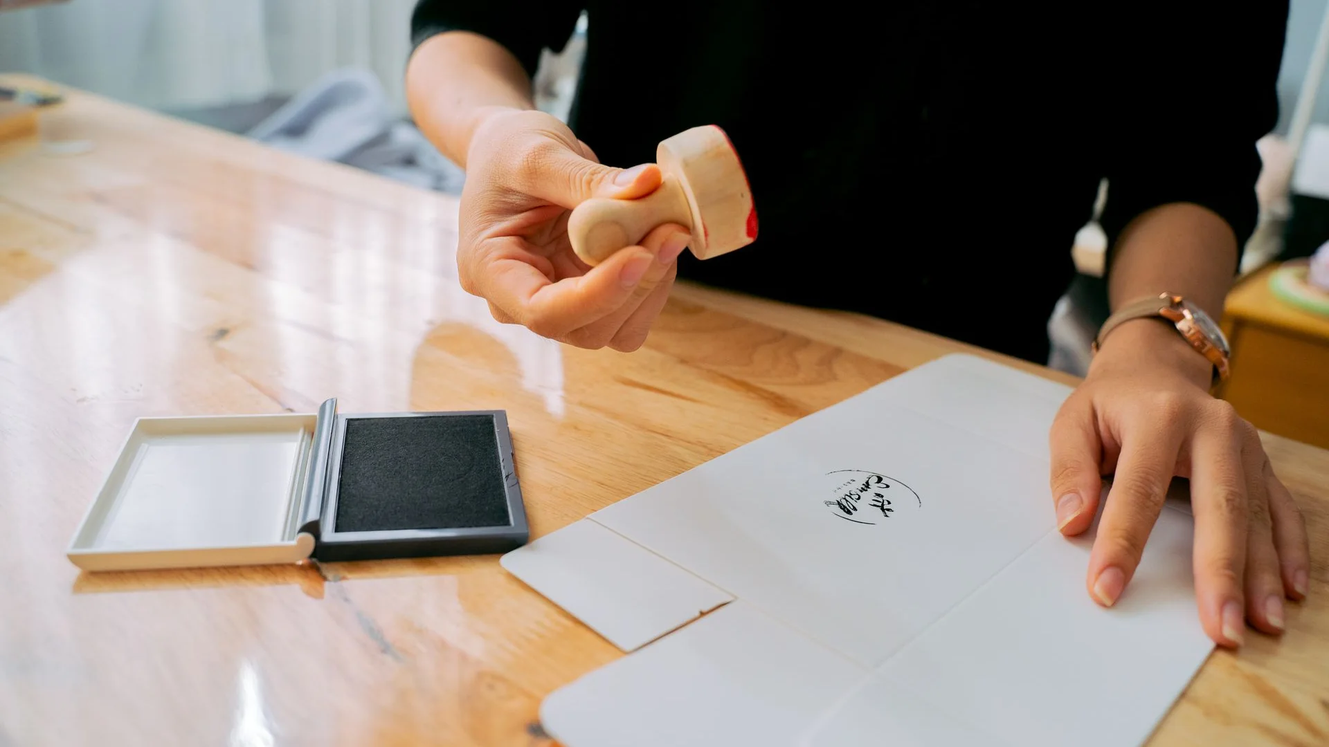 A wooden stamp resting on a document.